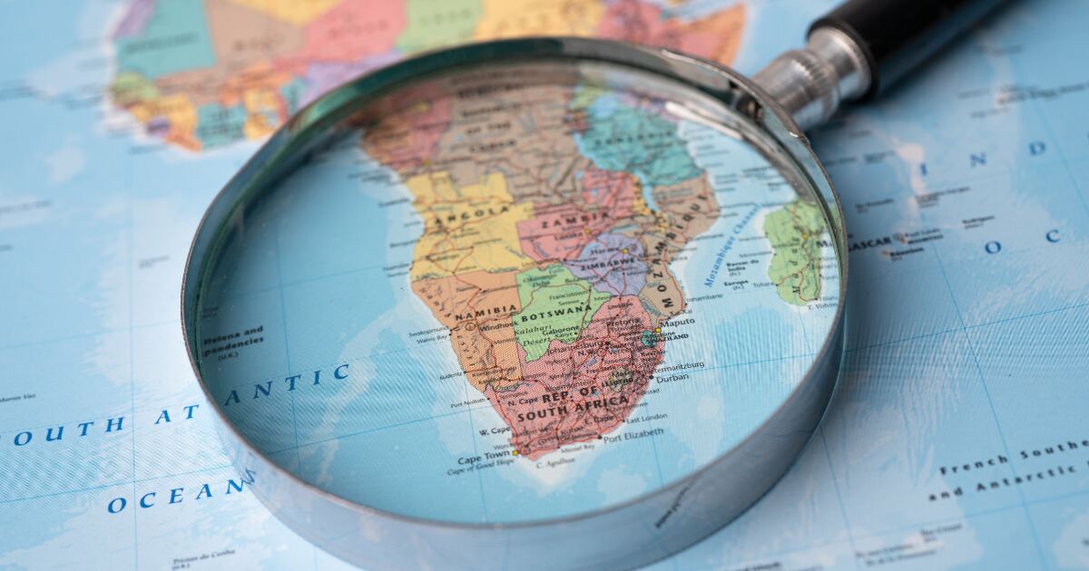 Magnifying glass over a map of Southern Africa